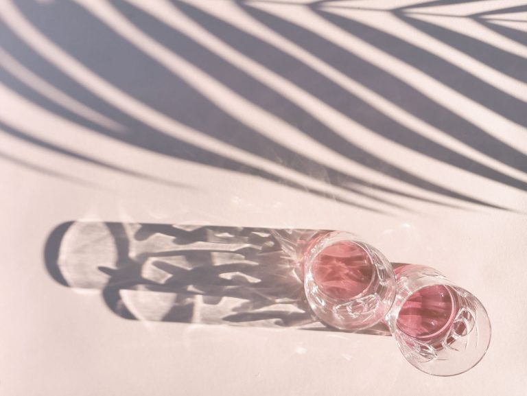two glasses of pink beverages